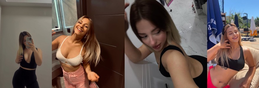 Woman in a black sports bra and leggings takes a mirror selfie in a room.